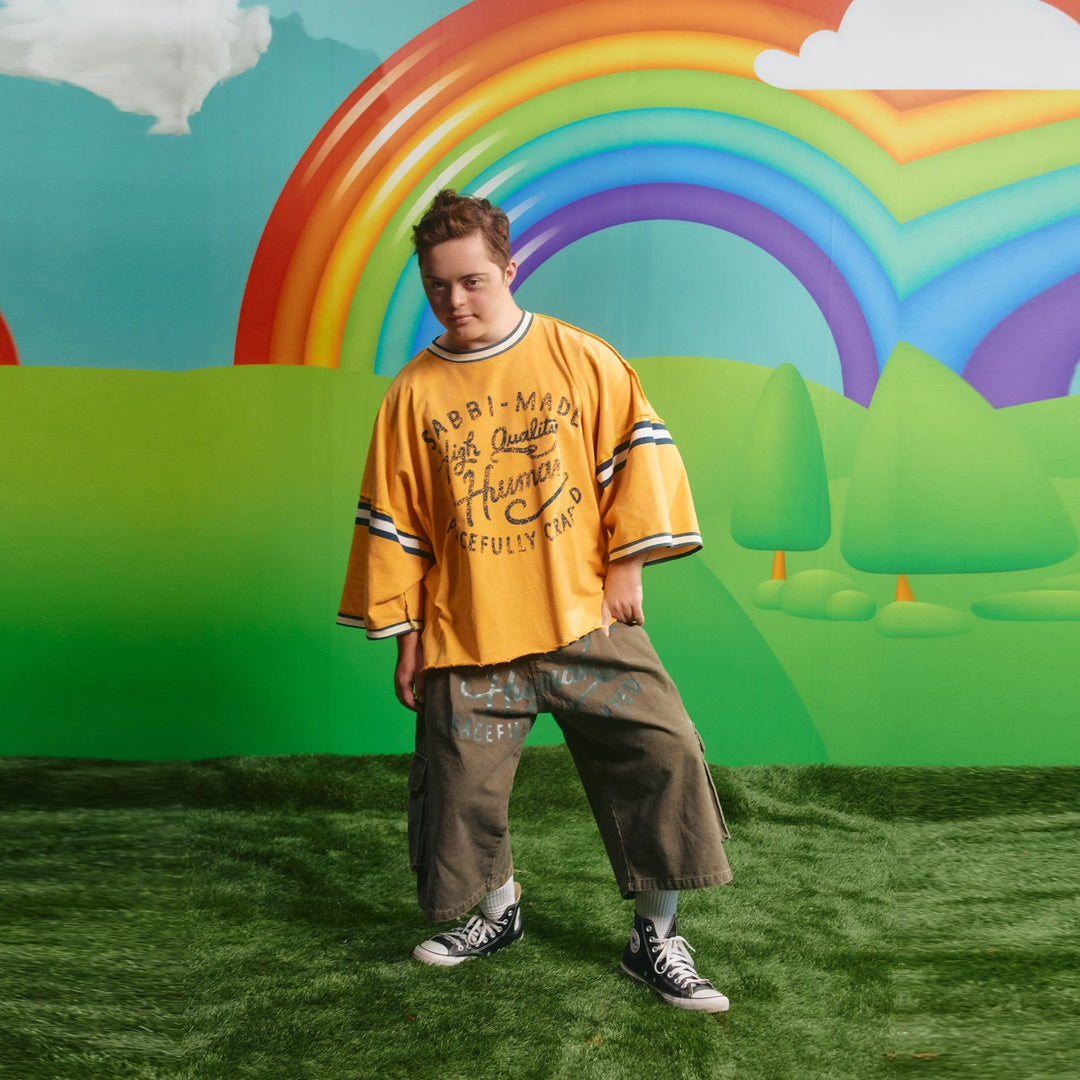 The Happy Hour Tee — model view with supplier scene