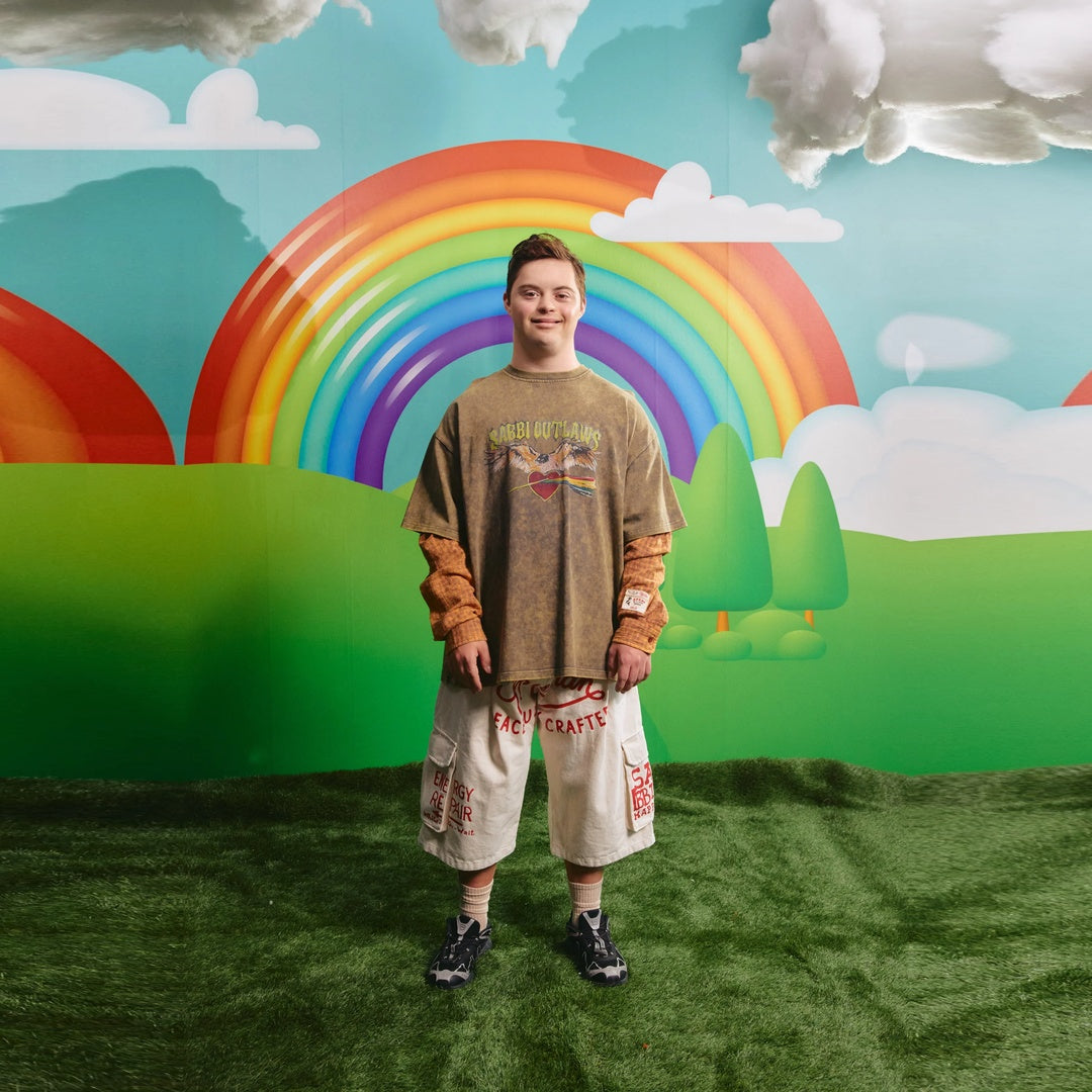 The Sabbi Outlaw Shirt Tee | Green/Orange — model view with supplier scene