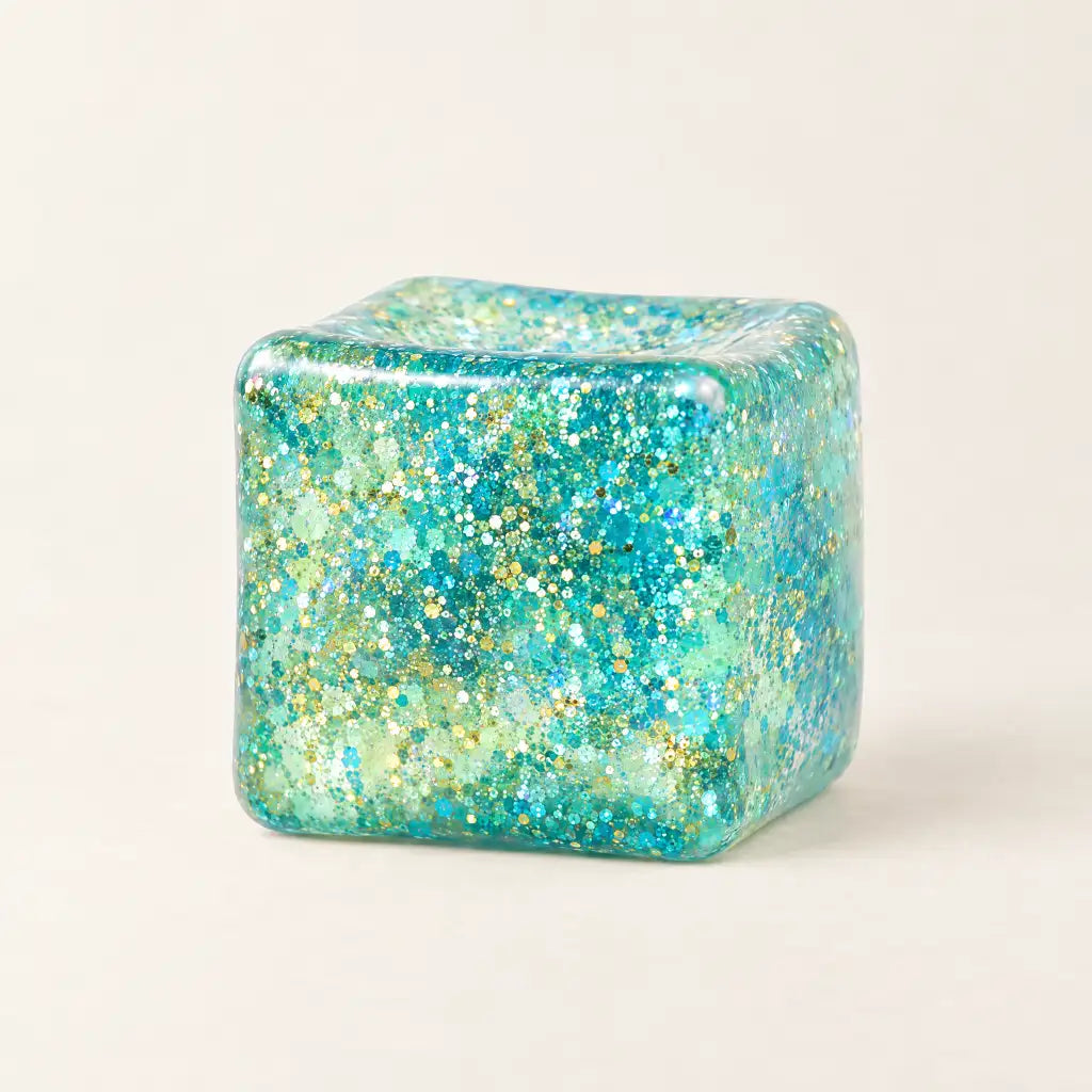 Aqua Discovery Zone Jumbo Sparkly Squish Cube, unboxed with a glittery finish.