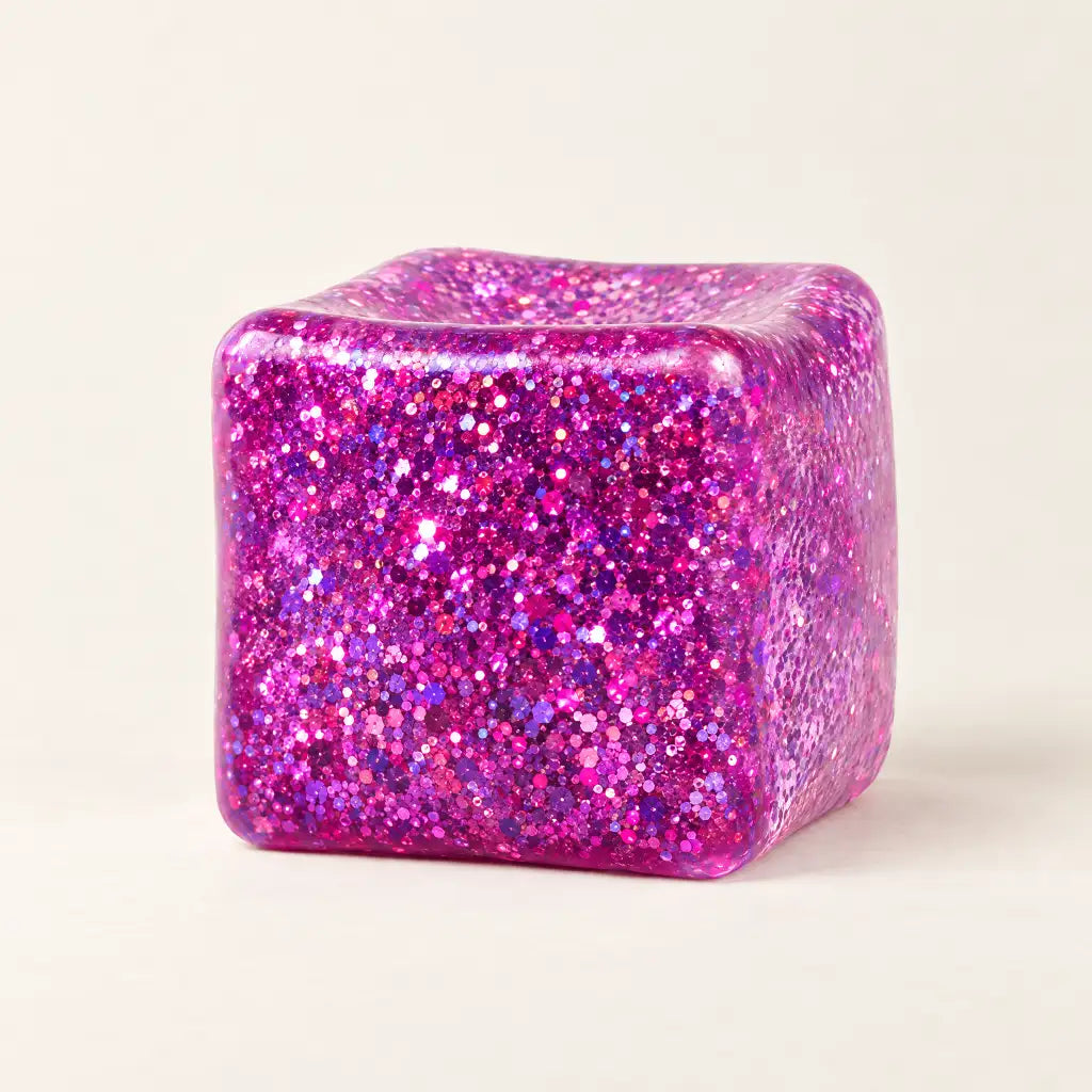 Purple Discovery Zone Jumbo Sparkly Squish Cube, unboxed with a glittery finish.