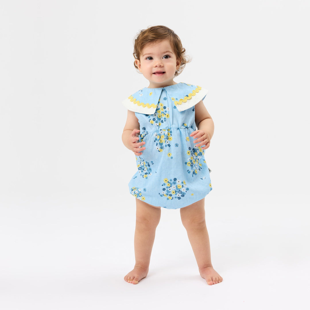Floral Ava Collared Romper | Sky Blue — lifestyle view