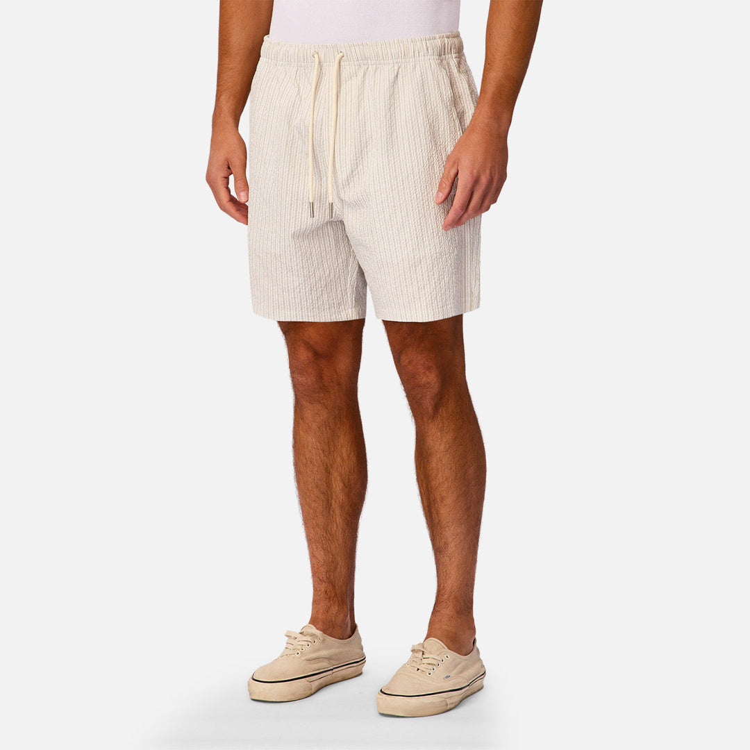 The Escala Swim Short in Beige Cream — official image 03