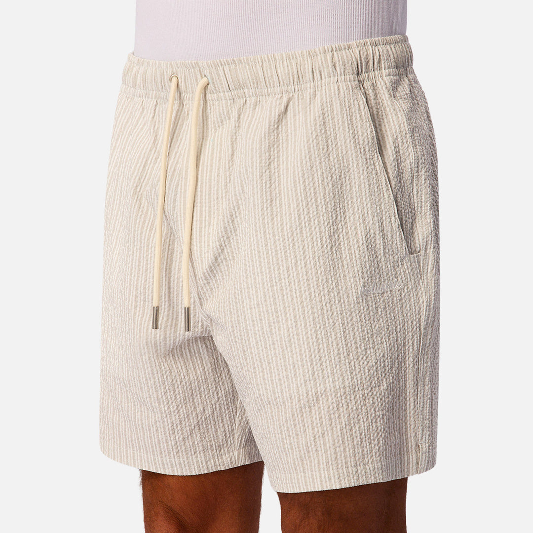 The Escala Swim Short in Beige Cream — official image 06