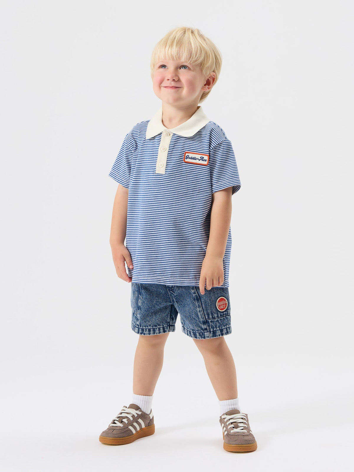 Navy Stripe Logo Polo Top worn on body