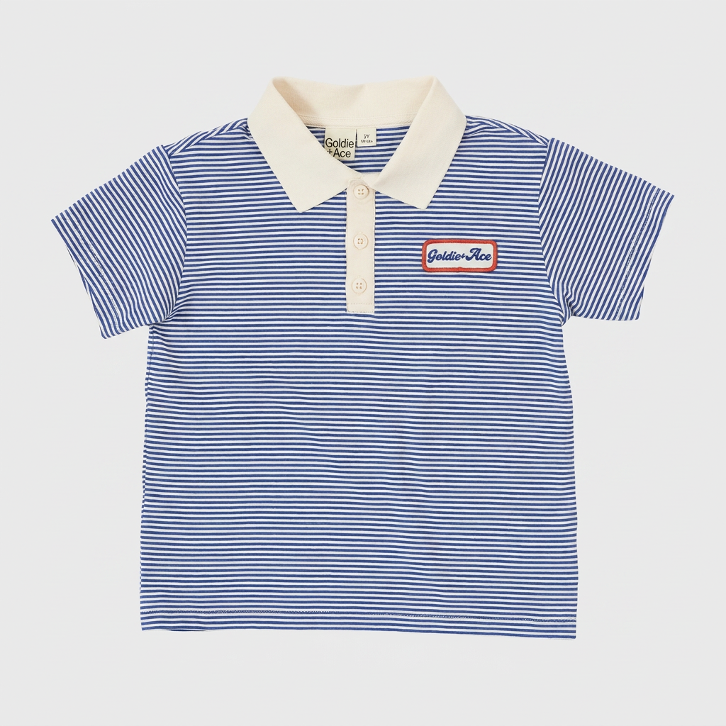 Navy Stripe Logo Polo Top flatlay on ebebeb background