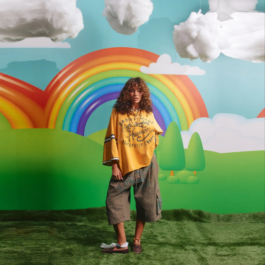 The Happy Hour Tee — model view with supplier scene