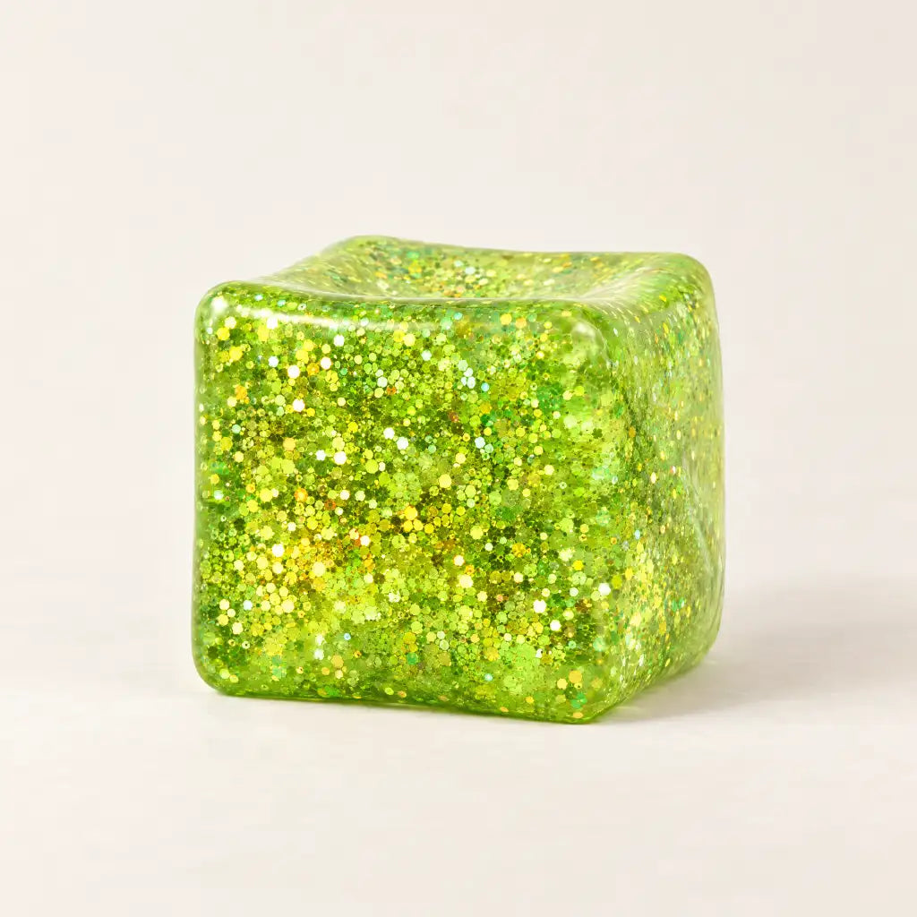 Green Discovery Zone Jumbo Sparkly Squish Cube, unboxed with a glittery finish.