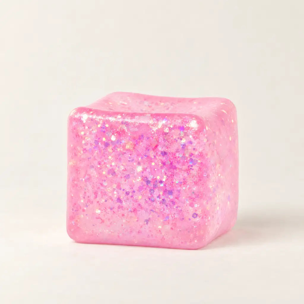Pink Discovery Zone Jumbo Sparkly Squish Cube, unboxed with a glittery finish.