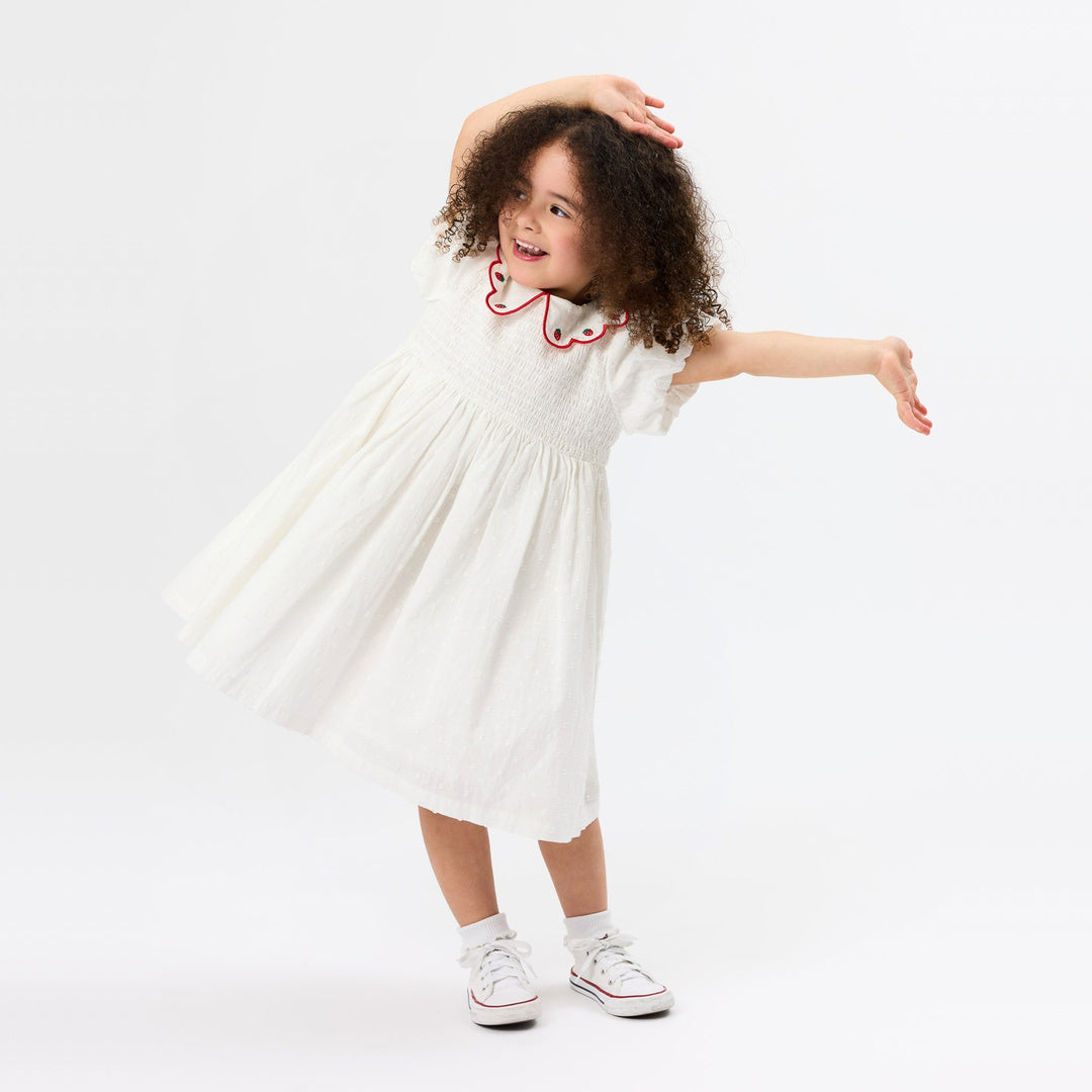 Sweet Strawberry Flo Smocked Dress | White — lifestyle view