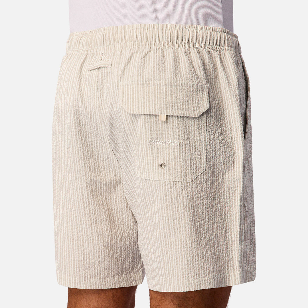 The Escala Swim Short in Beige Cream — official image 07