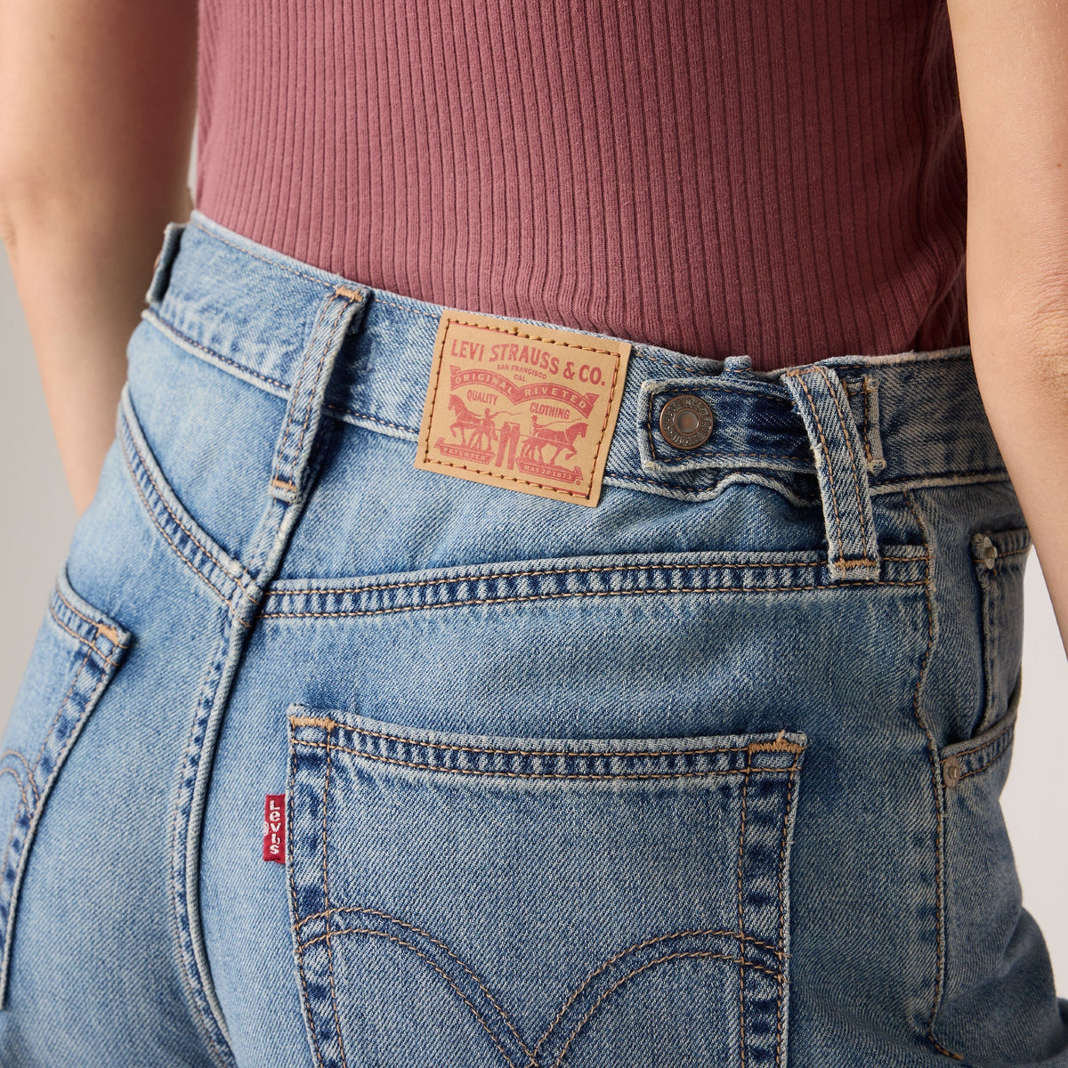 Cinch Mid-Thigh Shorts | Lift Up Short — on-model cinch/patch/waist detail
