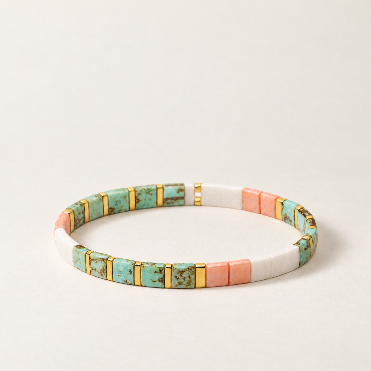 Muse Atelier Candy Tile Bracelet in Seafoam & Coral, shown on a warm neutral background