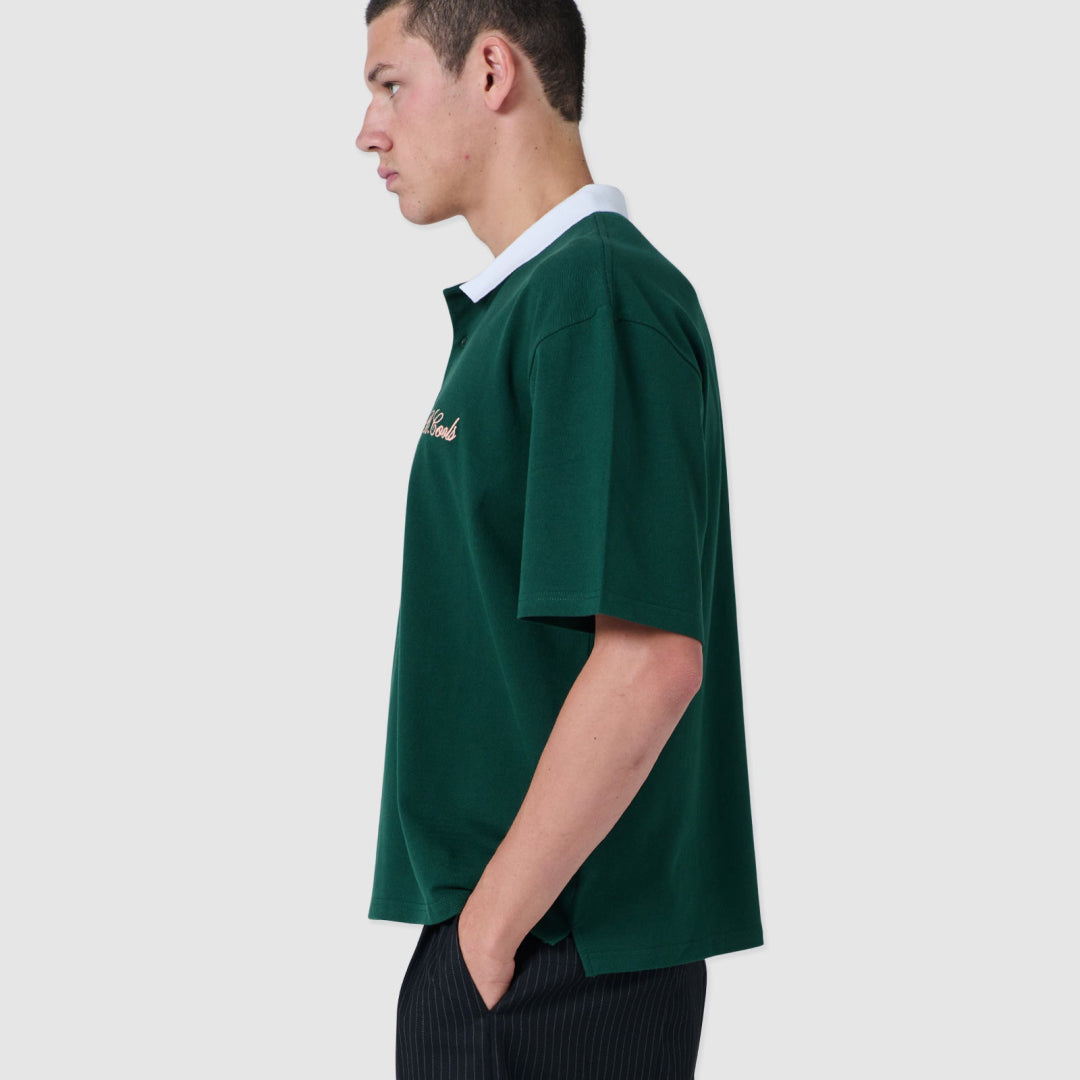 B.Cools Scribe Crop Polo in forest, worn back