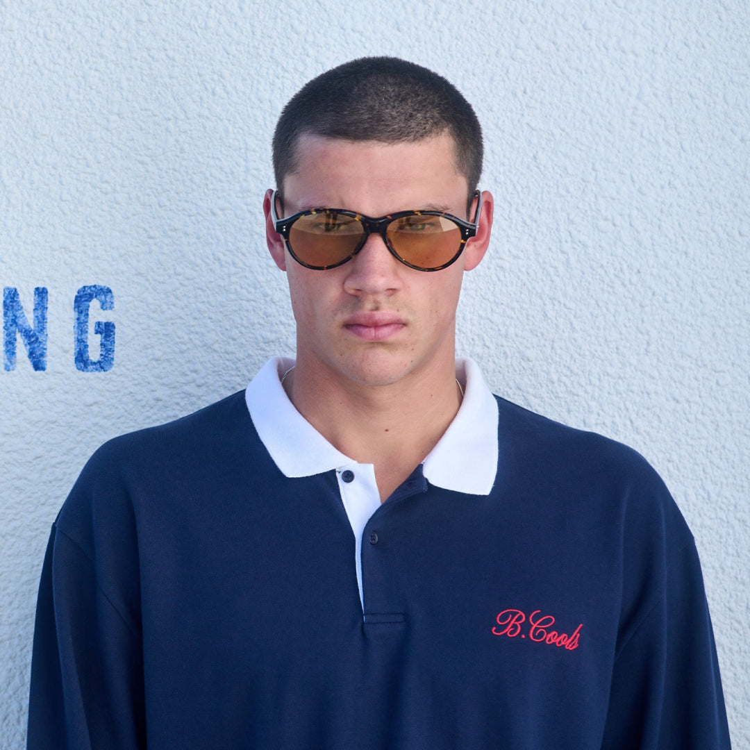B.Cools Scribe Crop Polo in navy, contrast rib detail