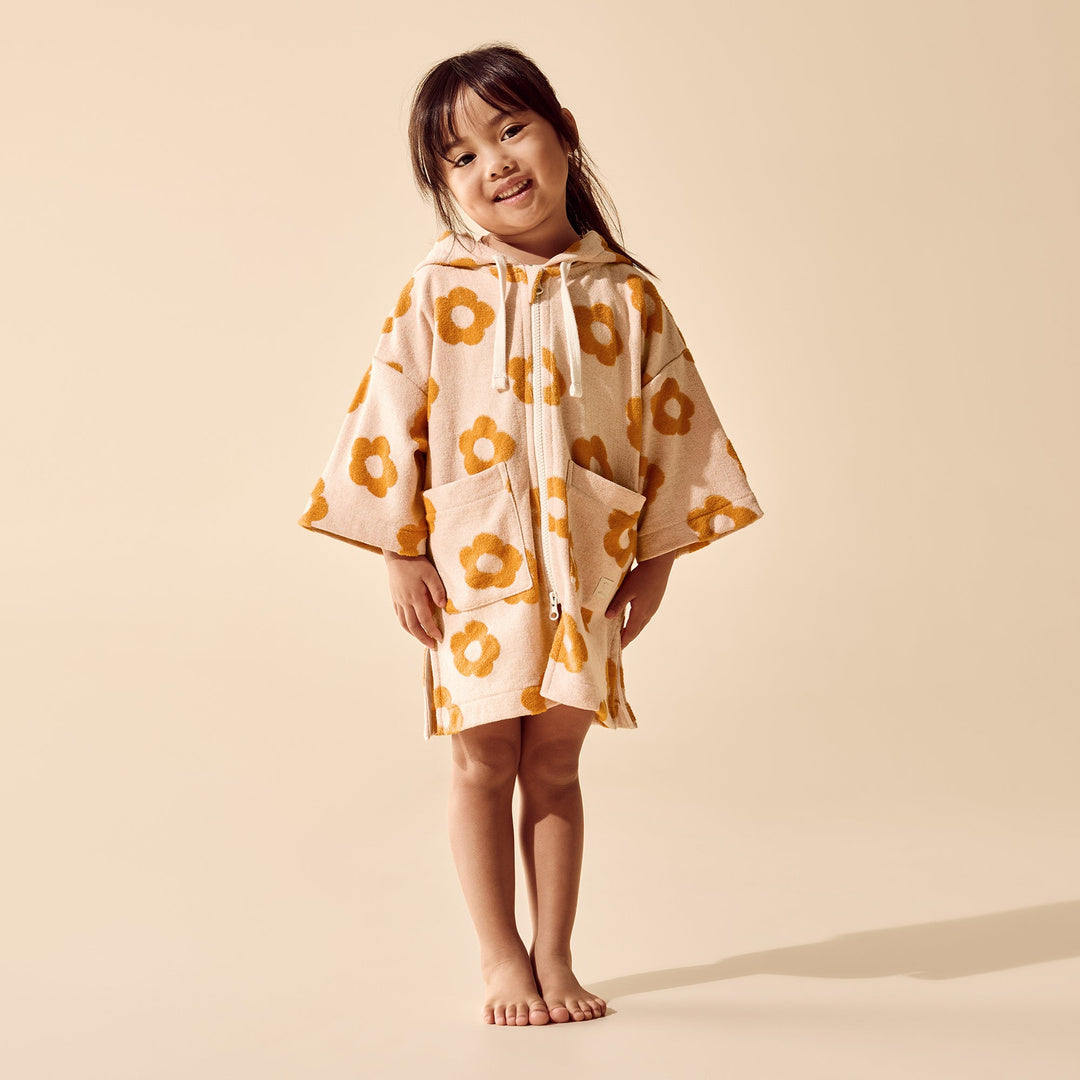Daisy Glow Organic Terry Hooded Towel lifestyle view