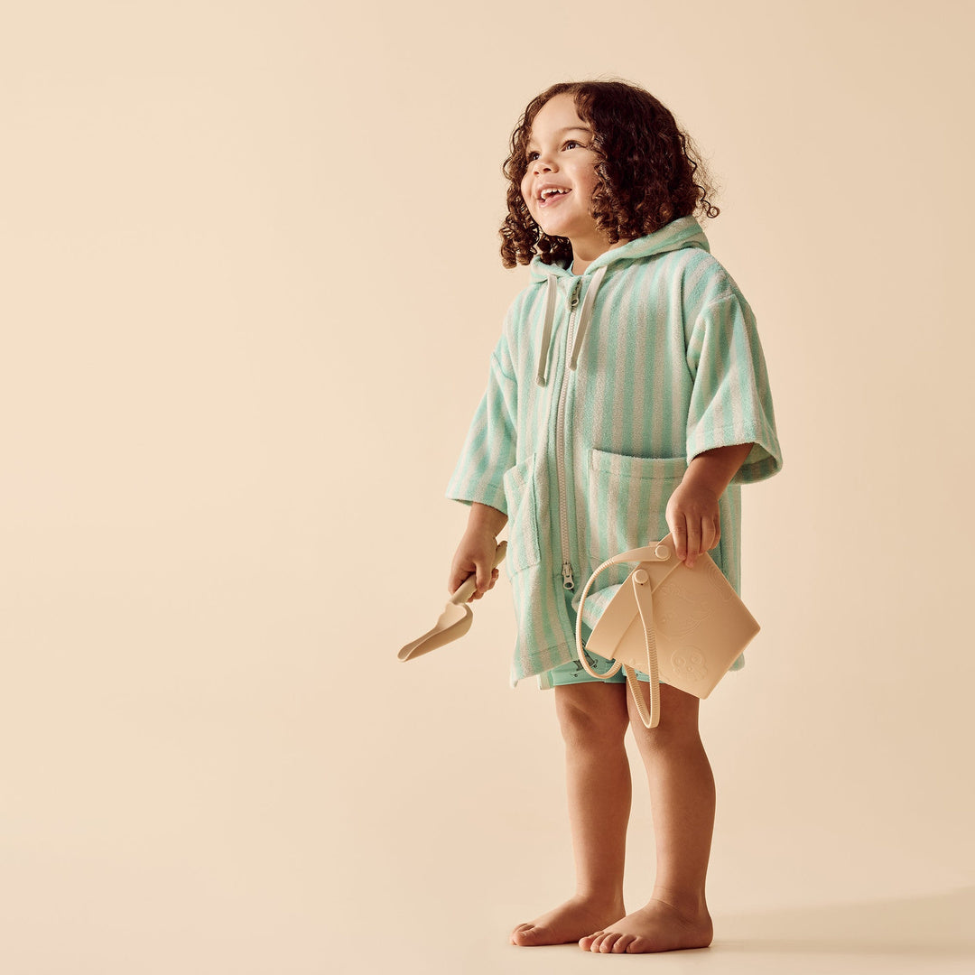 Seafoam Stripe Organic Terry Hooded Towel lifestyle view